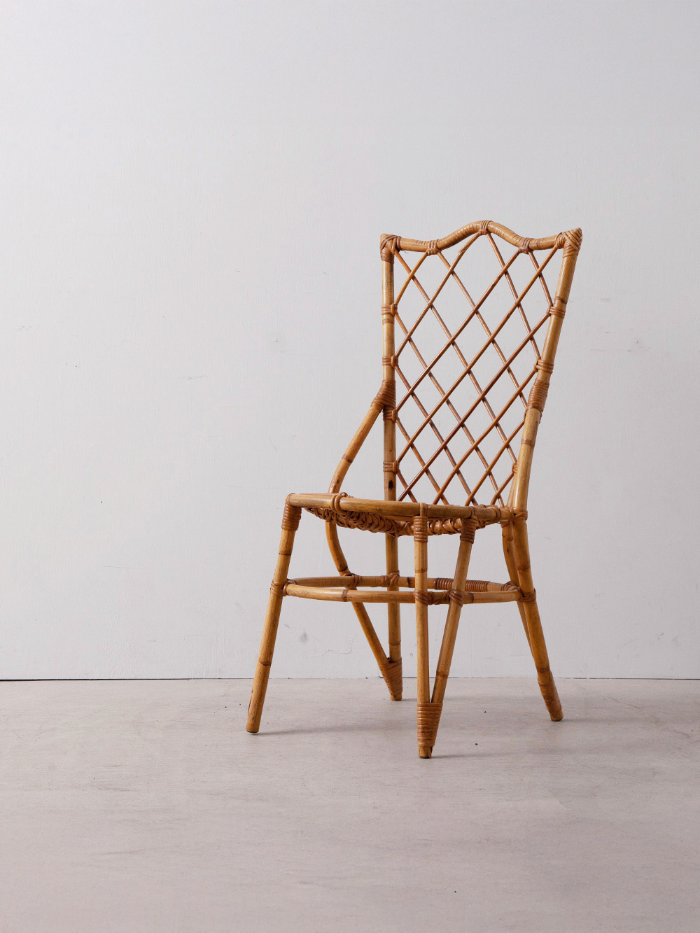 Rattan Chair by Louis Sognot