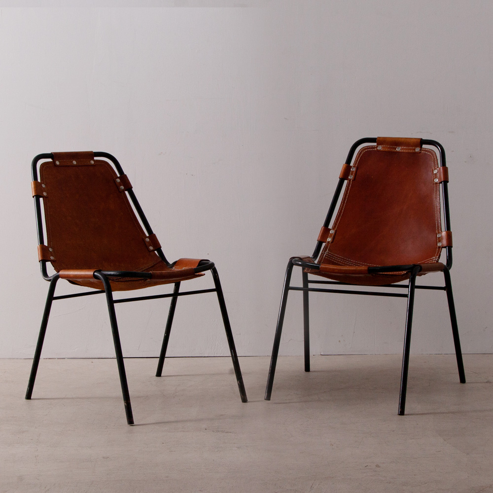 stoop | Les arcs Chair in Leather and Steel by Charlotte Perriand