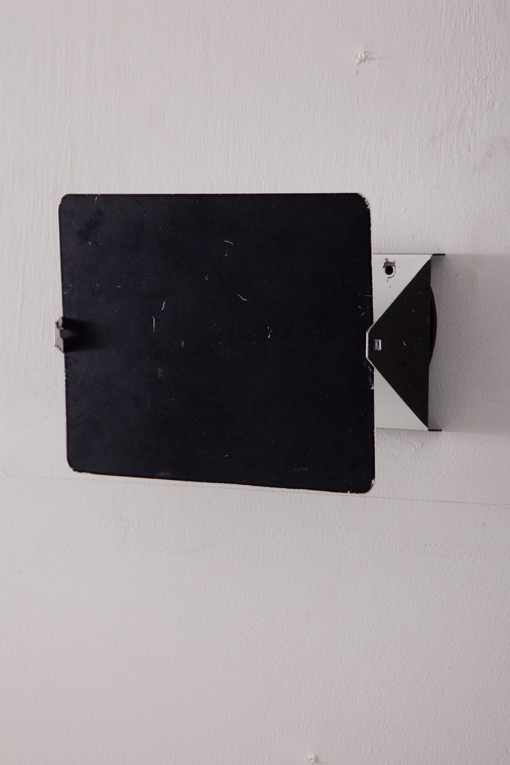 stoop | CP1 Wall Light in Black by Chalrotte Perriand
