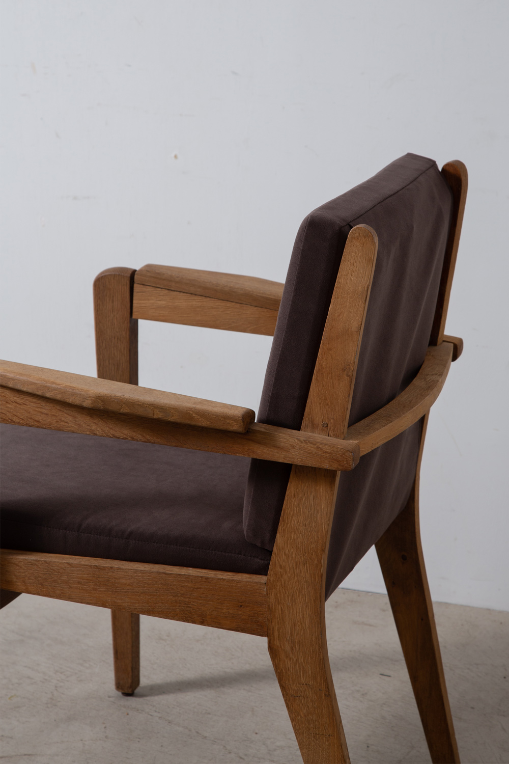 stoop | Arm Chair by Pierre Guariche in Oak and Suede