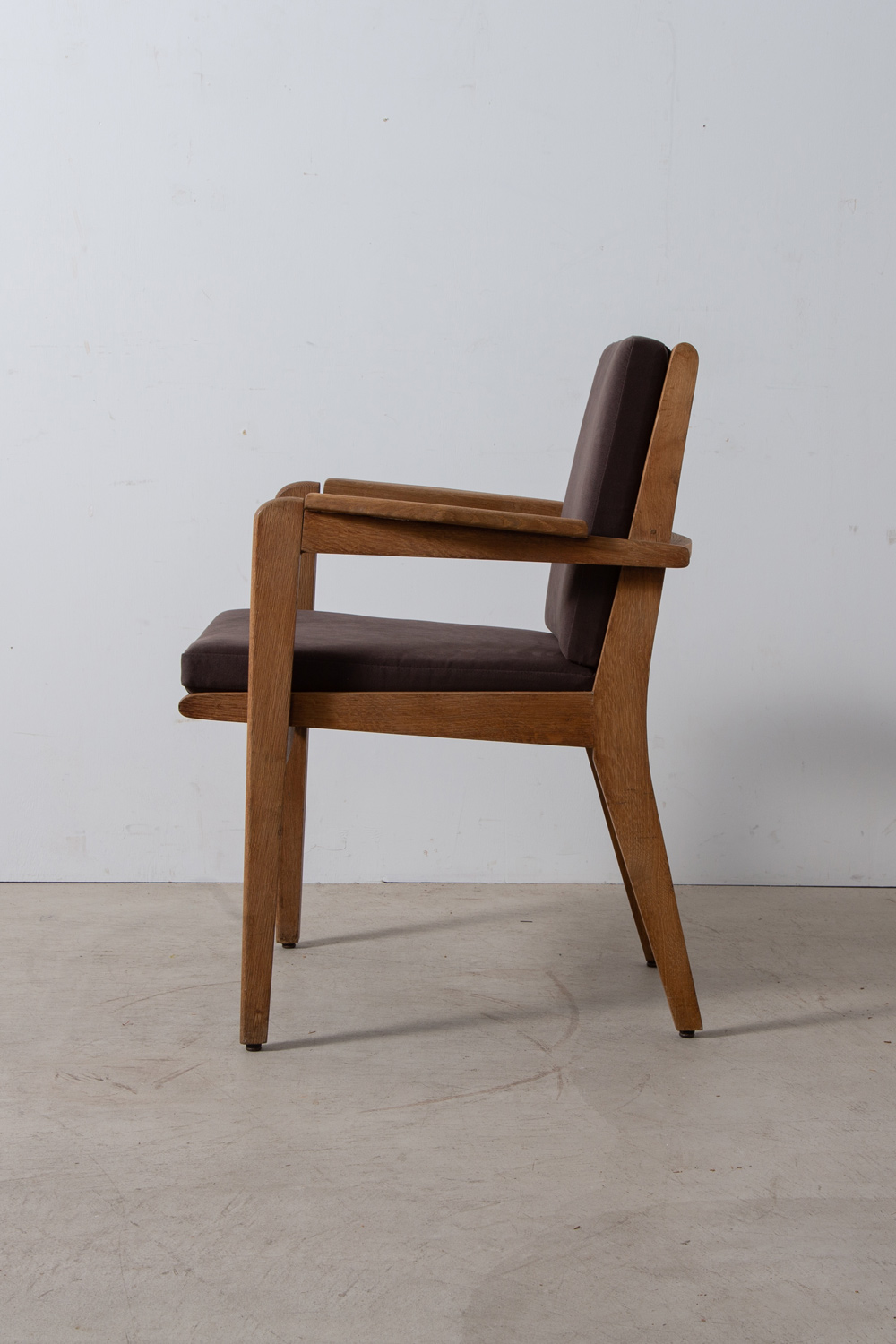 stoop | Arm Chair by Pierre Guariche in Oak and Suede