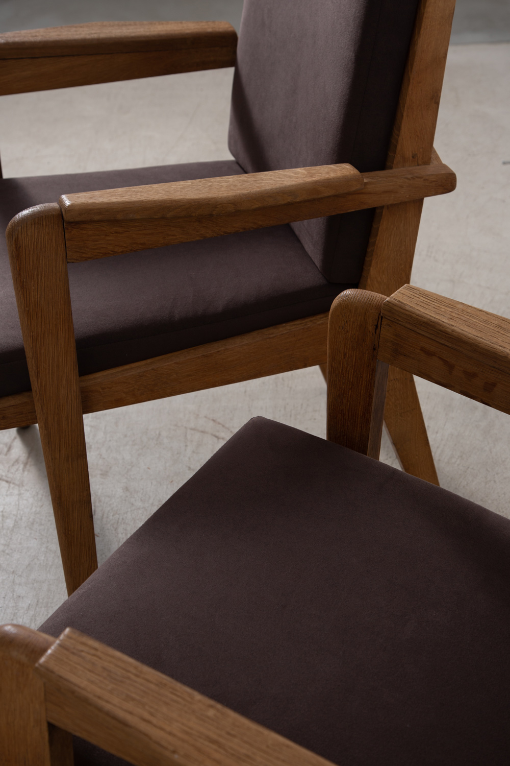 stoop | Arm Chair by Pierre Guariche in Oak and Suede