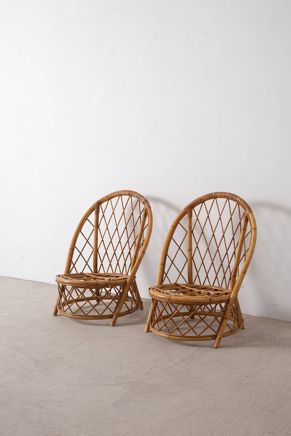 Low Chairs and Magazine Rack by Audoux & Minet in Rattan