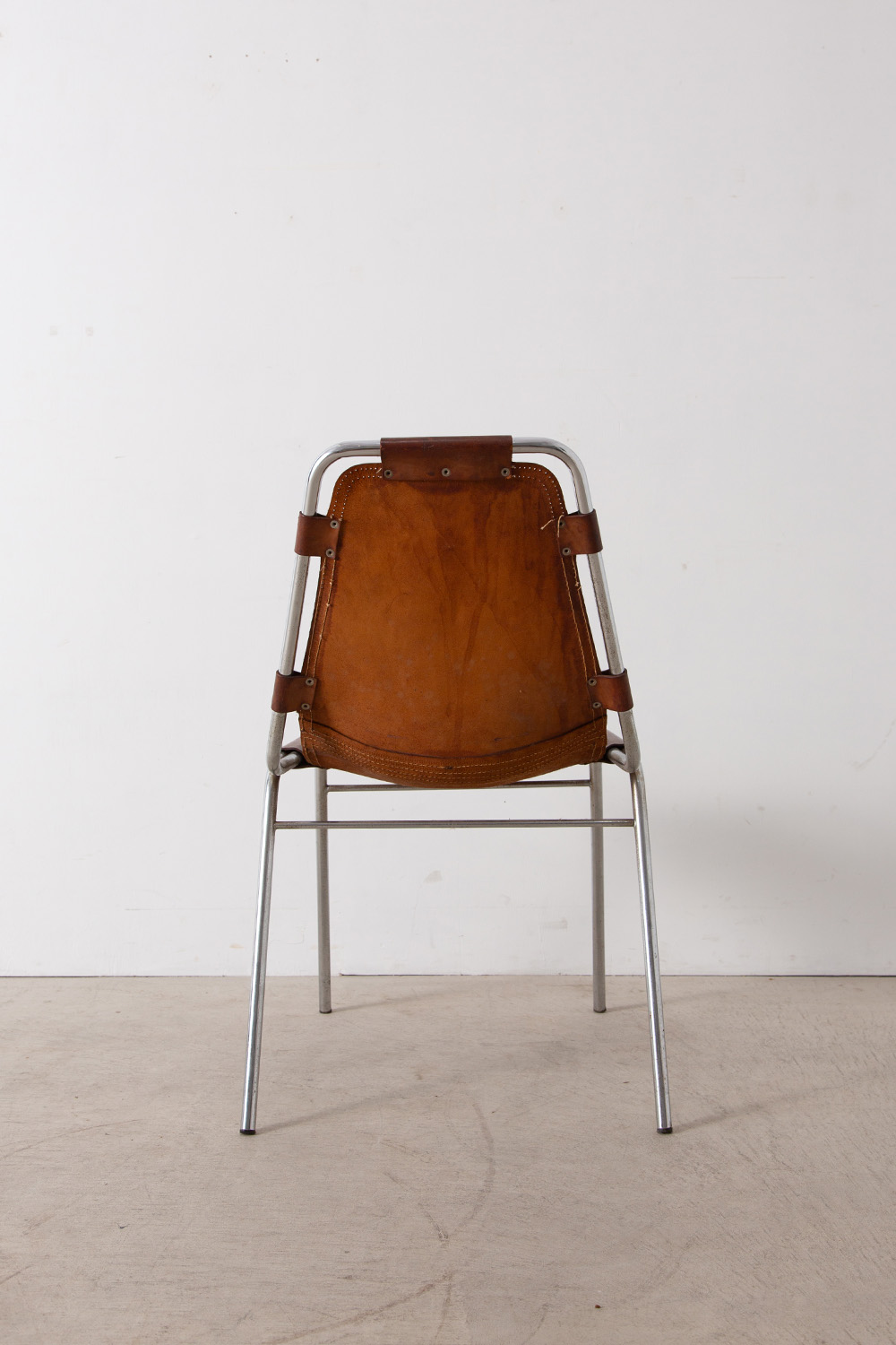 Les arcs Chair in Leather and Steel by Charlotte Perriand