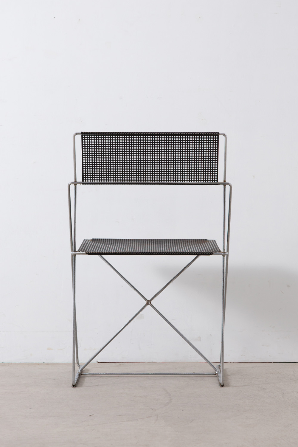 stoop | X-LINE Chair by Niels Jorgen Haugesen for HYBODAN