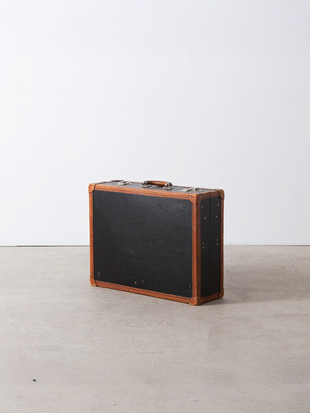 Suitcase for INNOVATION in Black and Leather