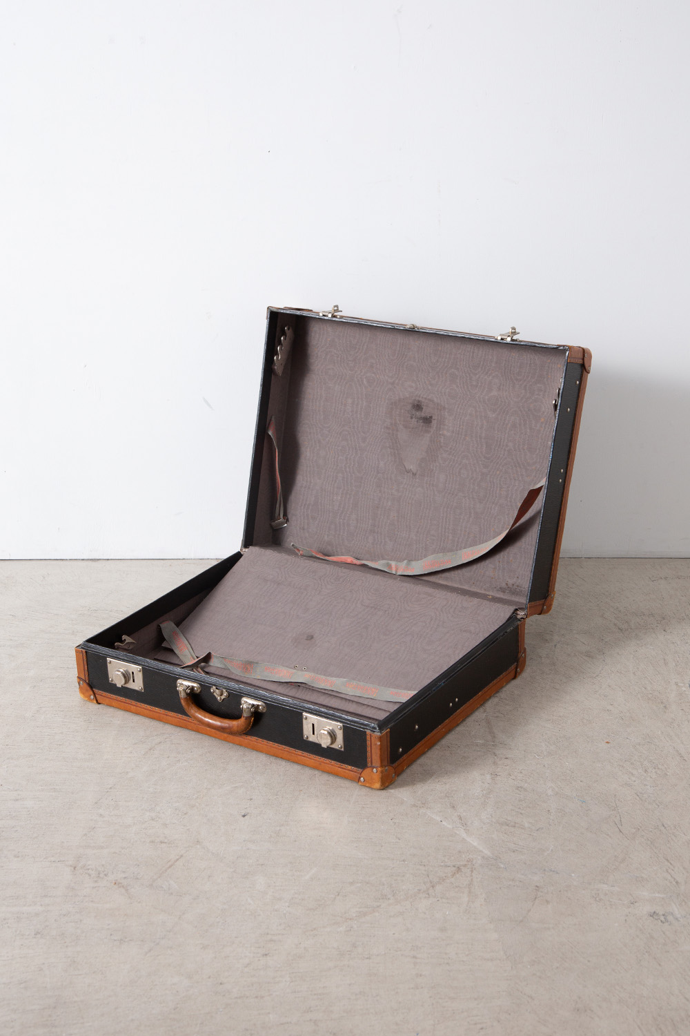 Suitcase for INNOVATION in Black and Leather