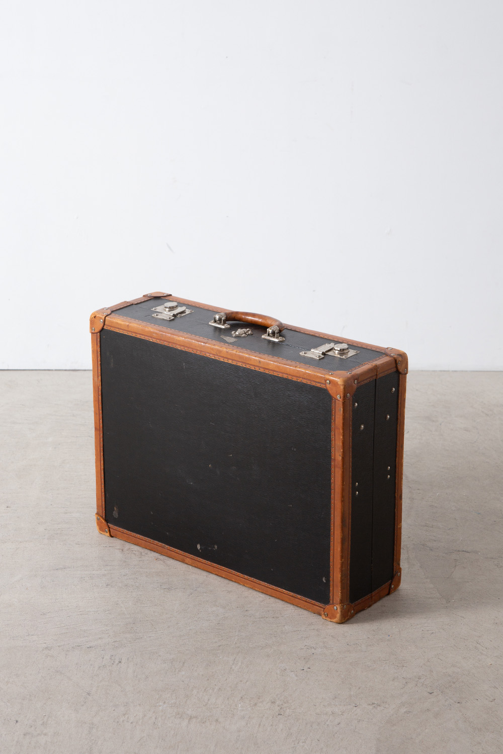 Suitcase for INNOVATION in Black and Leather