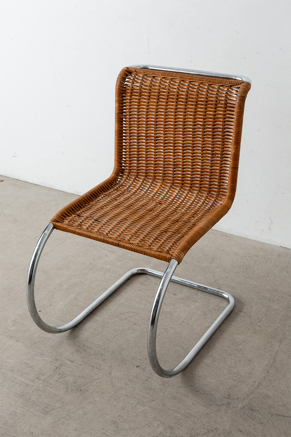 ‘MR10’ Chair by Mies van der Rohe in Chrome and Rattan