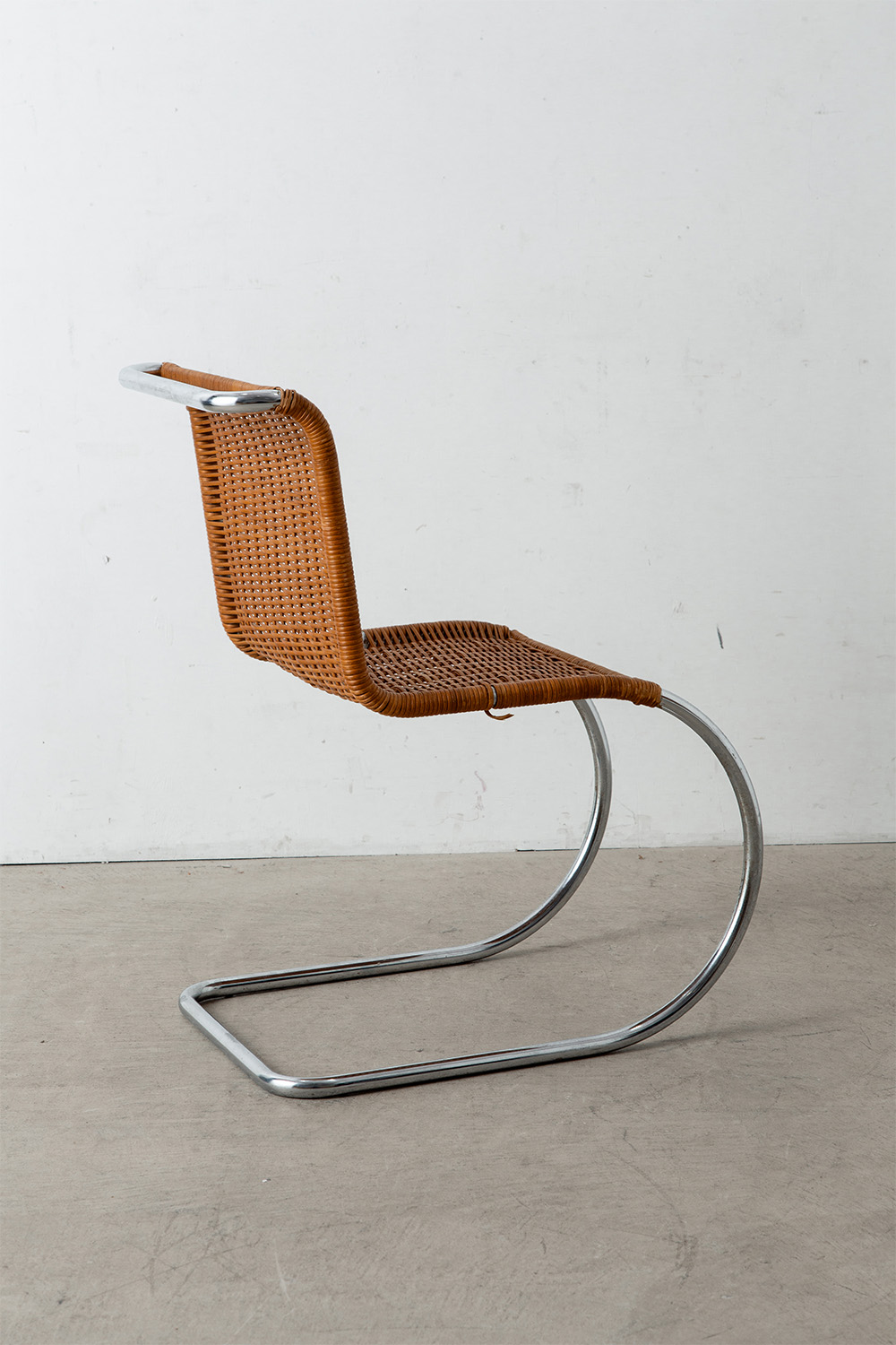 ‘MR10’ Chair by Mies van der Rohe in Chrome and Rattan