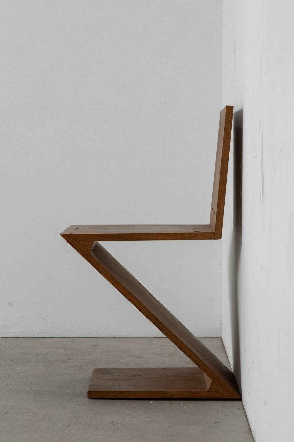 Zig Zag Chair by Gerrit Thomas Rietveld for METS & CO Edition in Wood and Brass