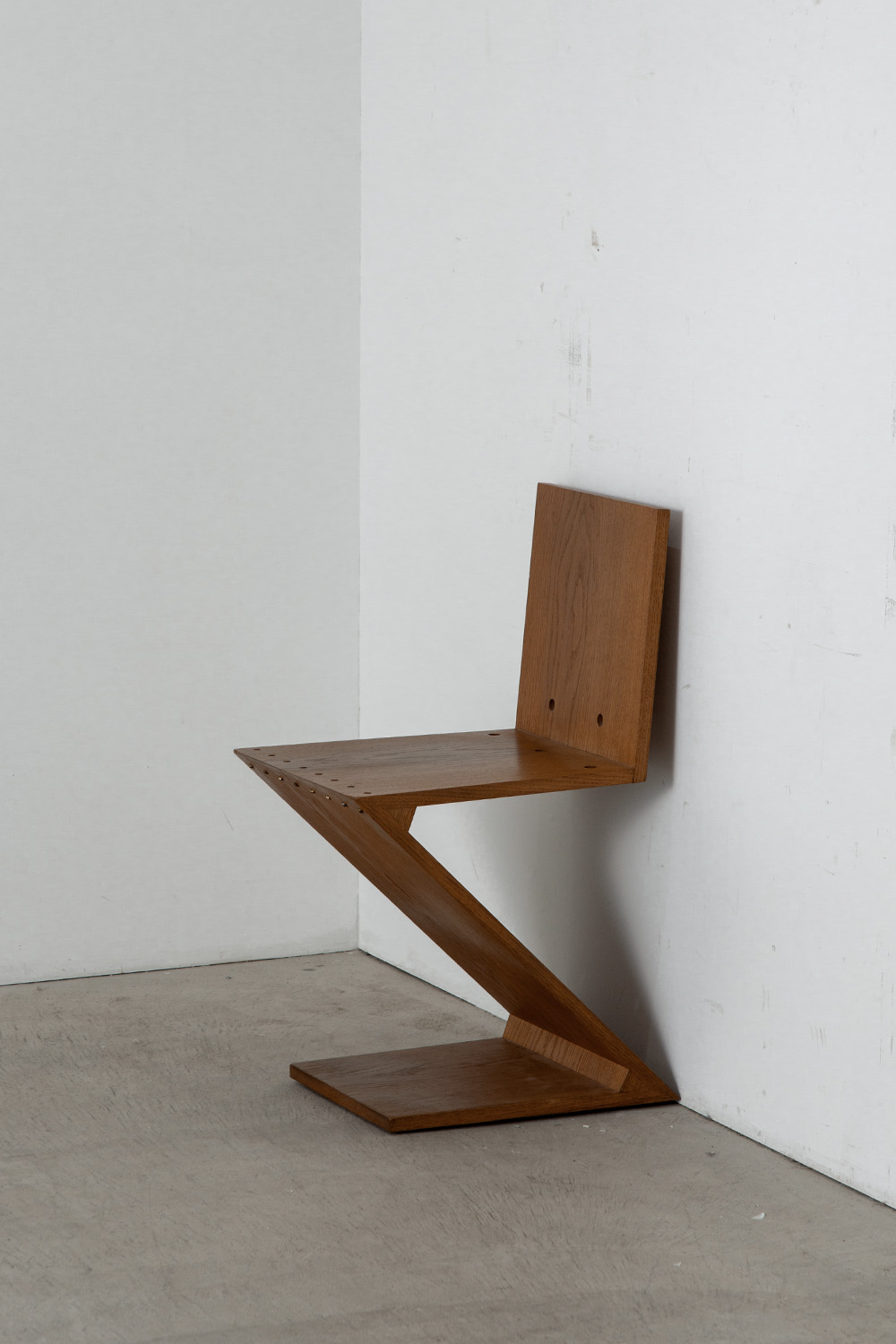 Zig Zag Chair by Gerrit Thomas Rietveld for METS & CO Edition in Wood and Brass