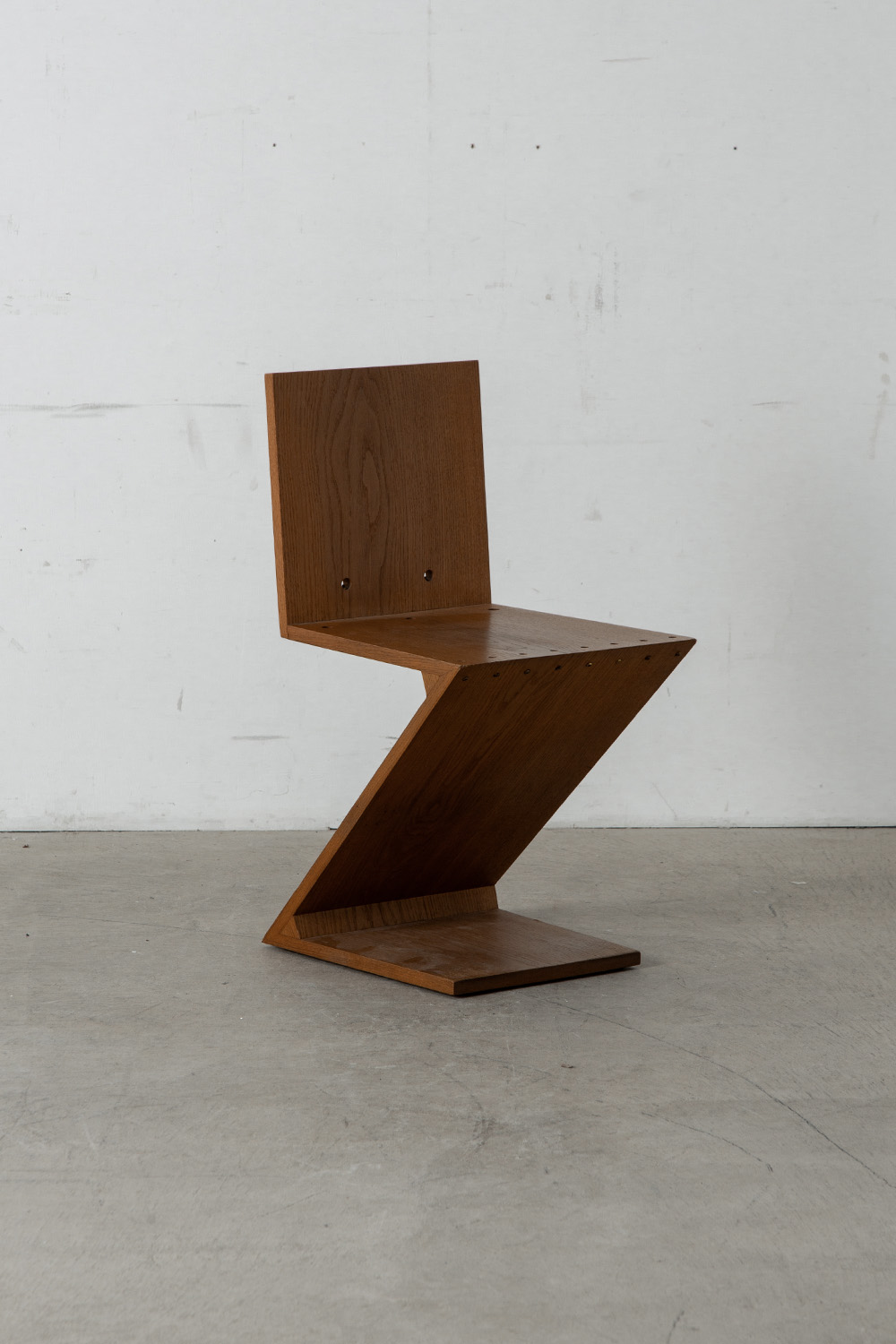 Zig Zag Chair by Gerrit Thomas Rietveld for METS & CO Edition in Wood and Brass