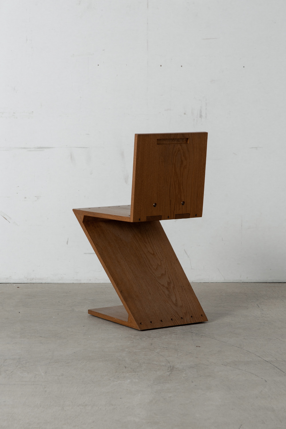 Zig Zag Chair by Gerrit Thomas Rietveld for METS & CO Edition in Wood and Brass