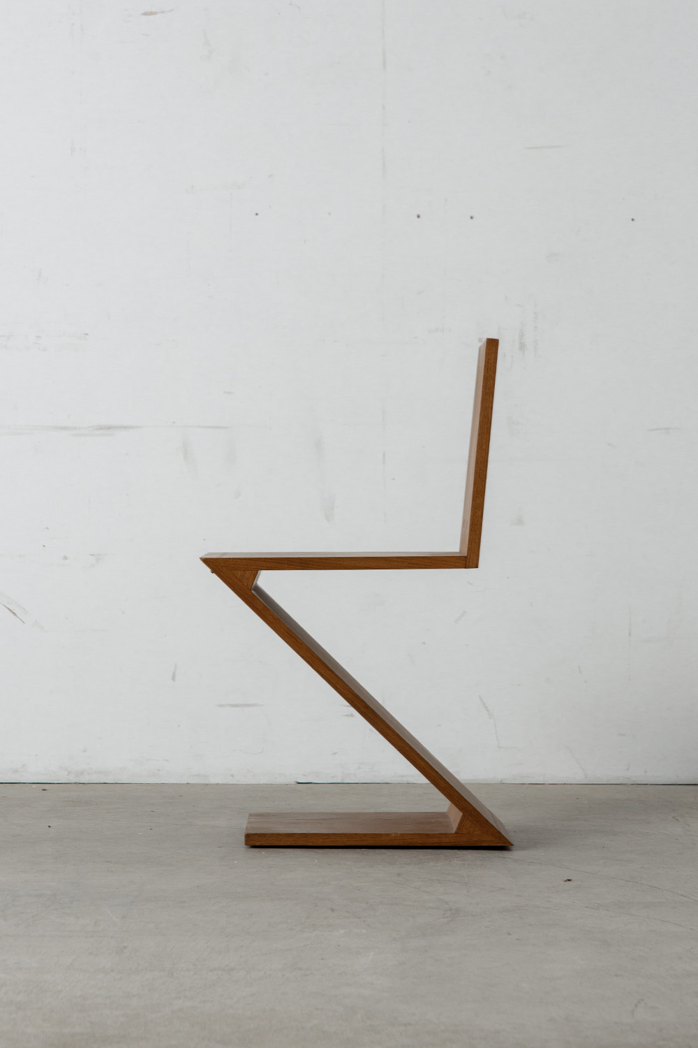 Zig Zag Chair by Gerrit Thomas Rietveld for METS & CO Edition in Wood and Brass