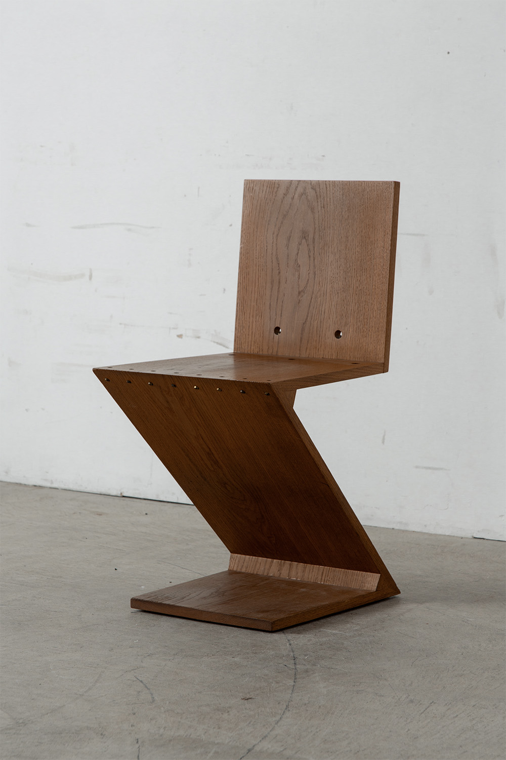 Zig Zag Chair by Gerrit Thomas Rietveld for METS & CO Edition in Wood and Brass