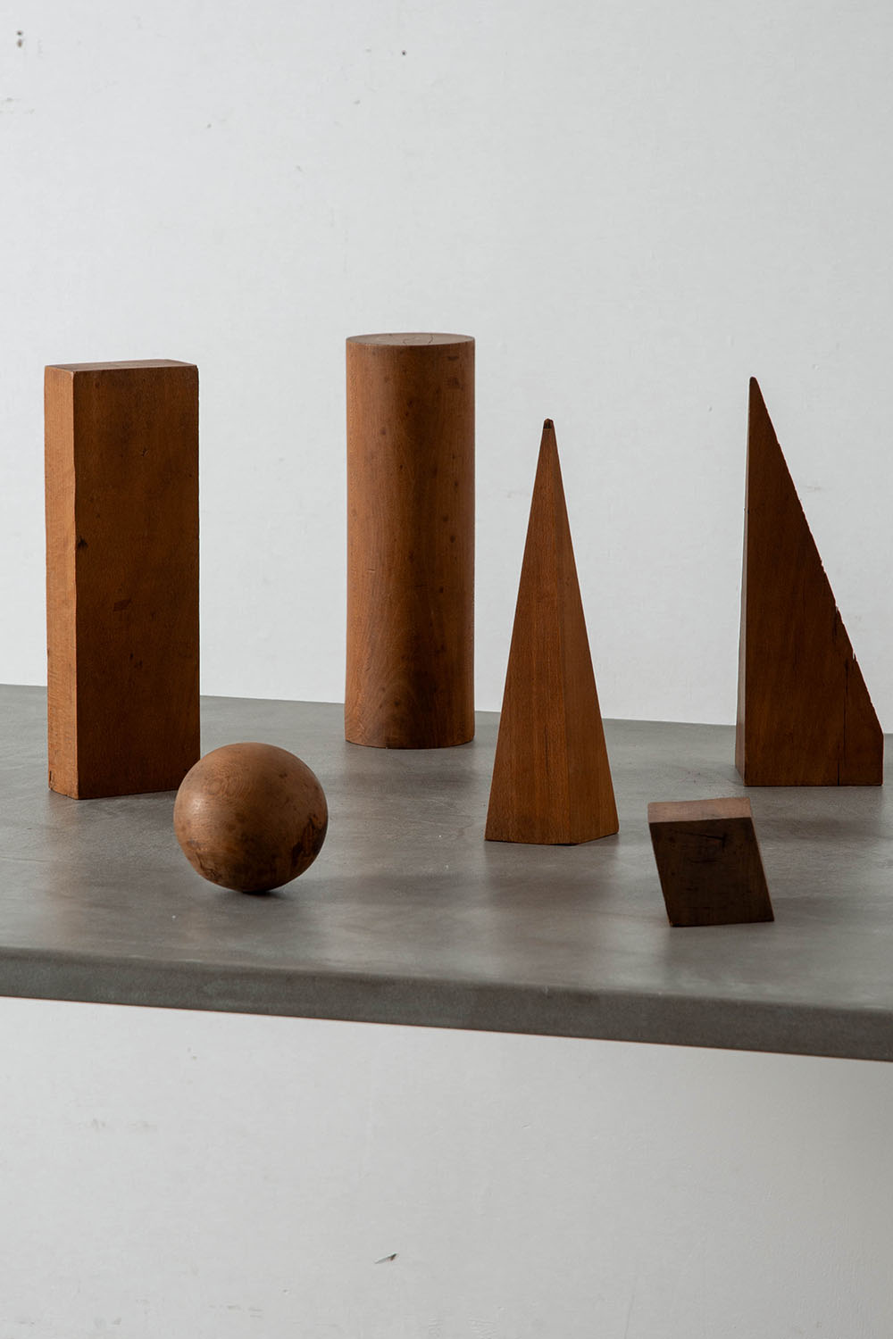 Geometric Shaped Objects Set in Wood
