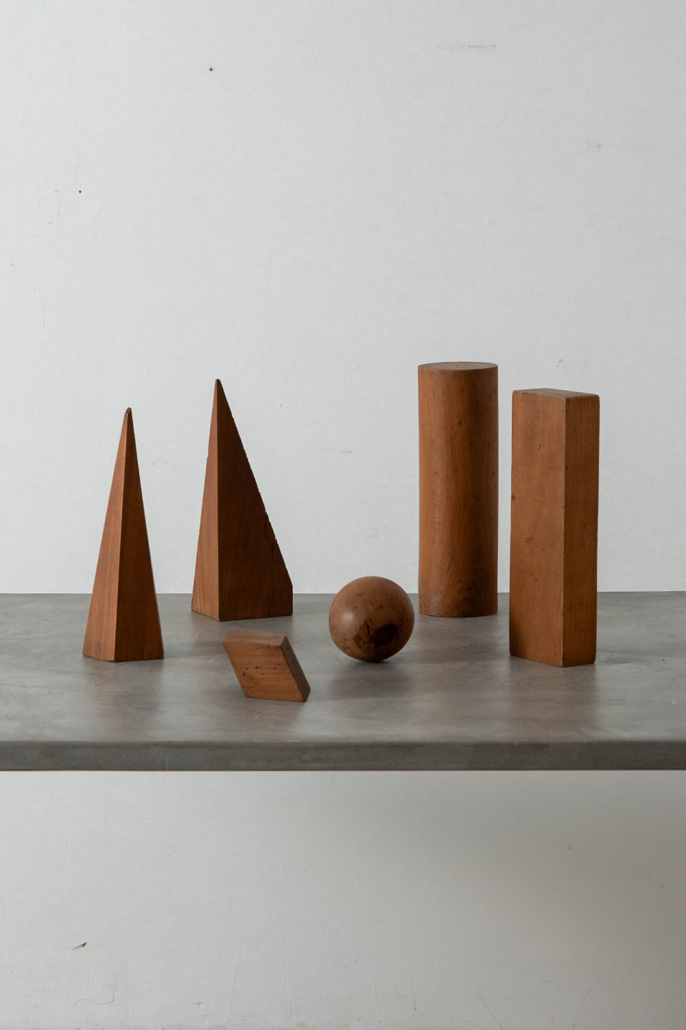 Geometric Shaped Objects Set in Wood