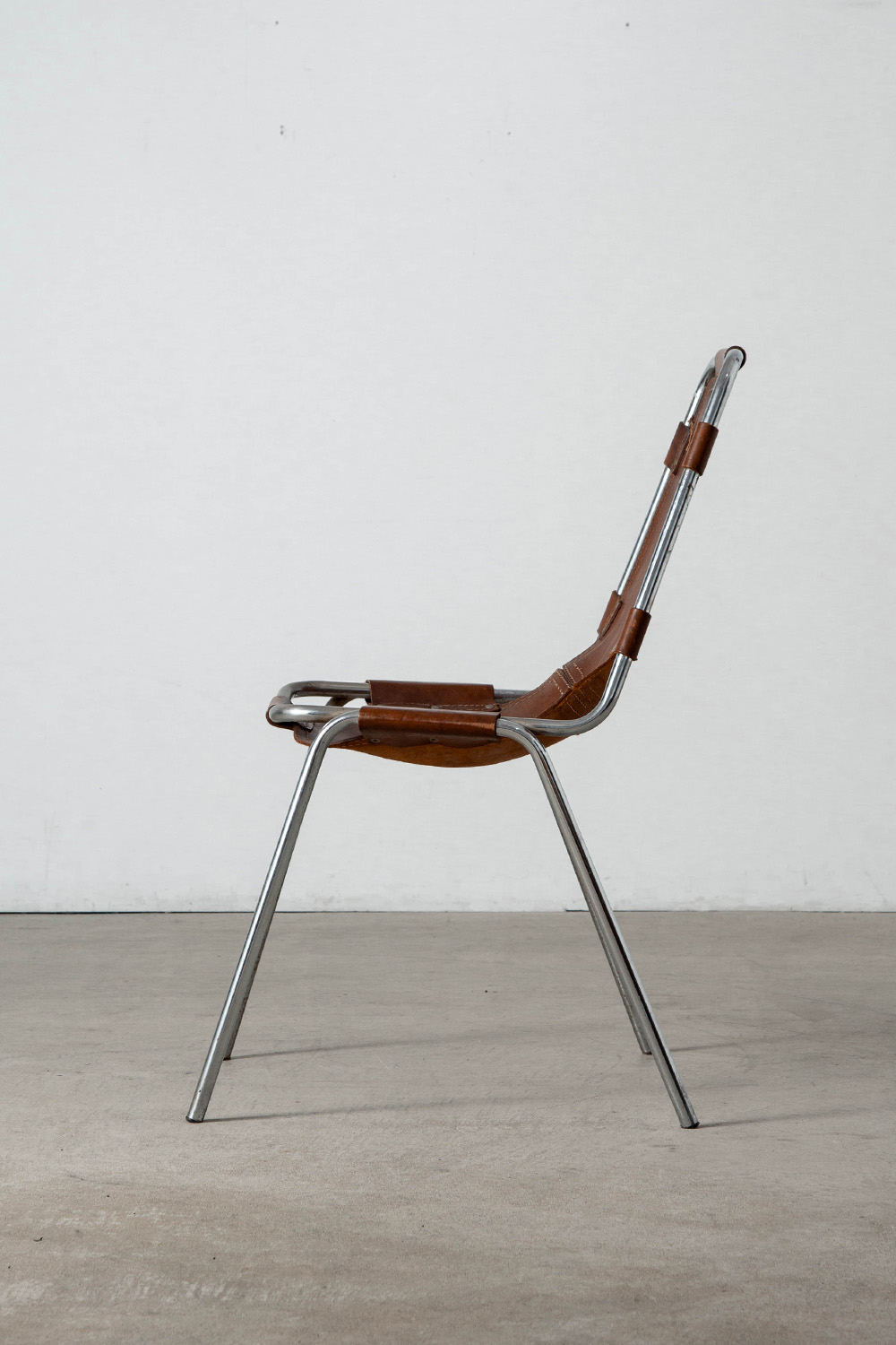 Les arcs Chair in Leather and Steel by Charlotte Perriand