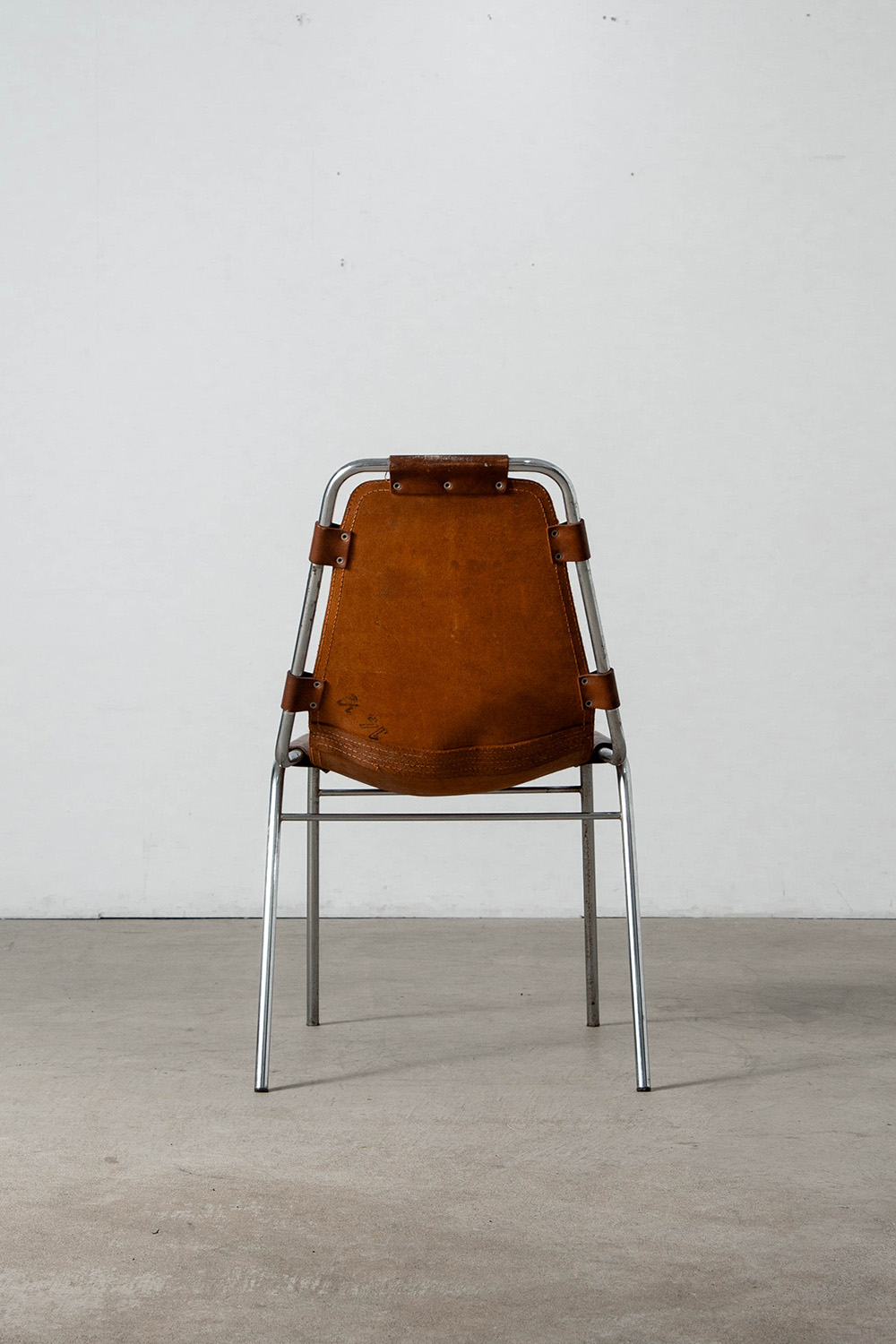 Les arcs Chair in Leather and Steel by Charlotte Perriand