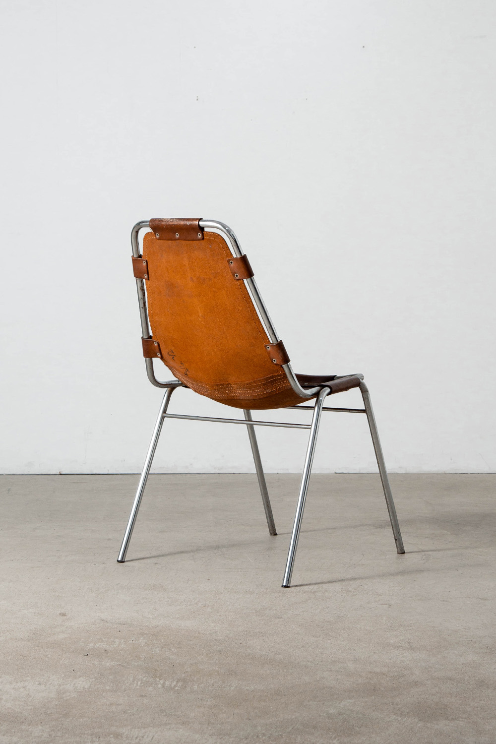 Les arcs Chair in Leather and Steel by Charlotte Perriand