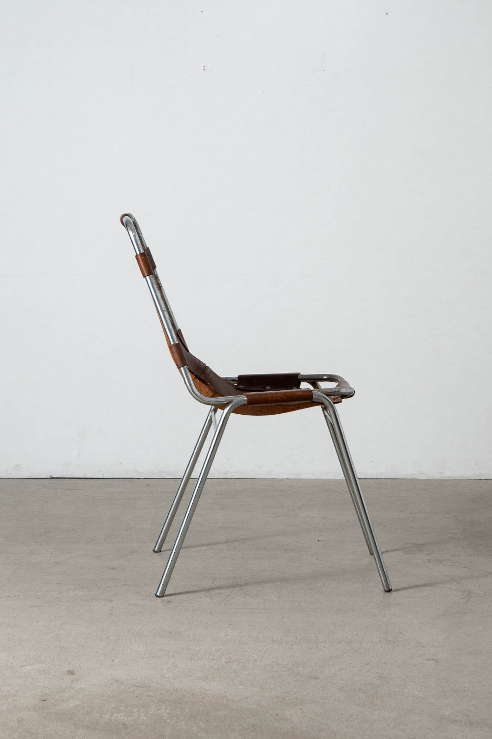 Les arcs Chair in Leather and Steel by Charlotte Perriand