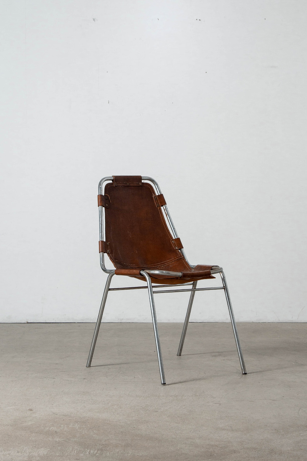 Les arcs Chair in Leather and Steel by Charlotte Perriand