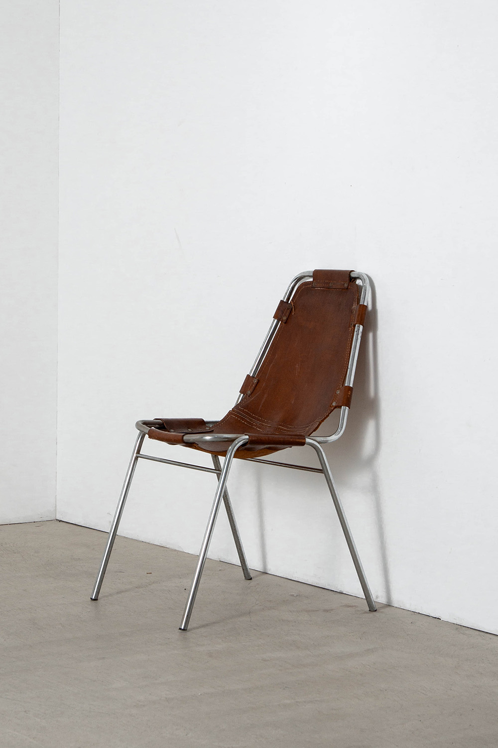 Les arcs Chair in Leather and Steel by Charlotte Perriand