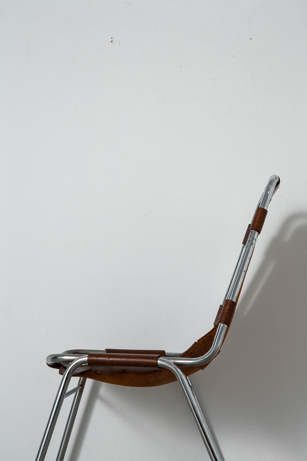 Les arcs Chair in Leather and Steel by Charlotte Perriand