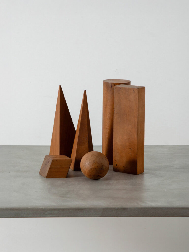Geometric Shaped Objects Set in Wood