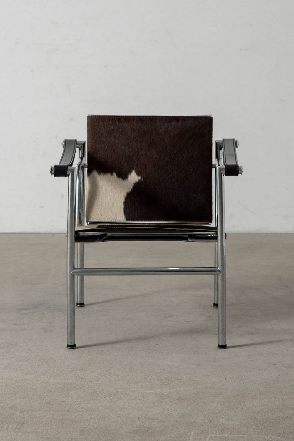 LC1 Chair by Le Corbusier , Charlotte Perriand , Pierre Jeanneret for Cassina in Calf Hair Leather and Chrome