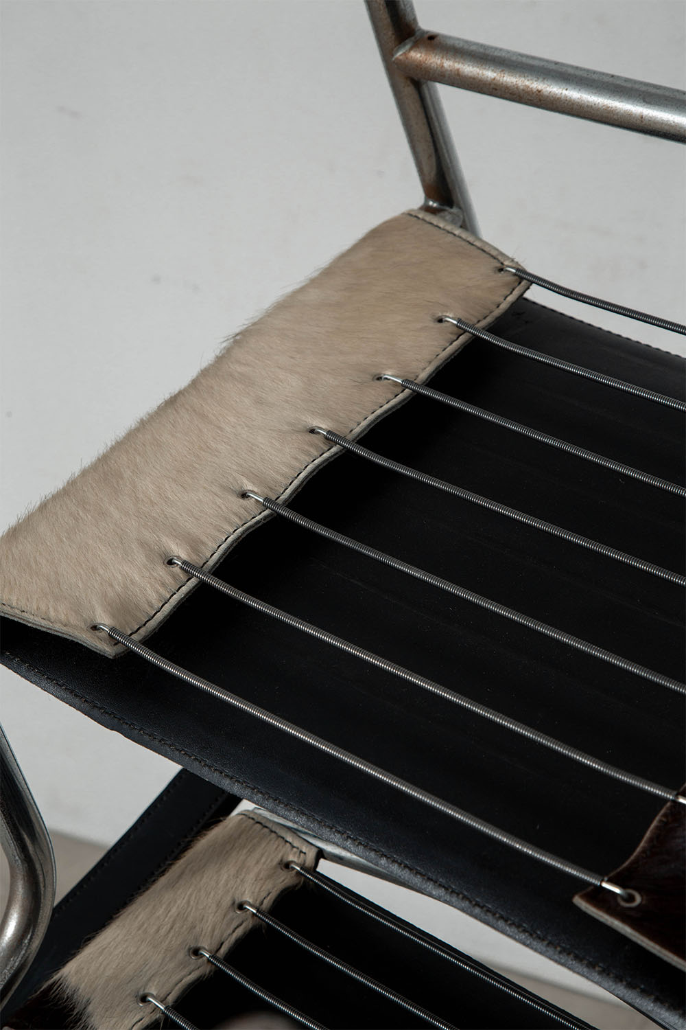 LC1 Chair by Le Corbusier , Charlotte Perriand , Pierre Jeanneret for Cassina in Calf Hair Leather and Chrome