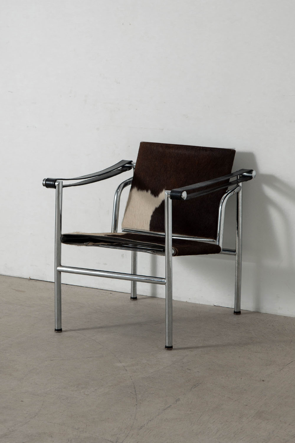 LC1 Chair by Le Corbusier , Charlotte Perriand , Pierre Jeanneret for Cassina in Calf Hair Leather and Chrome