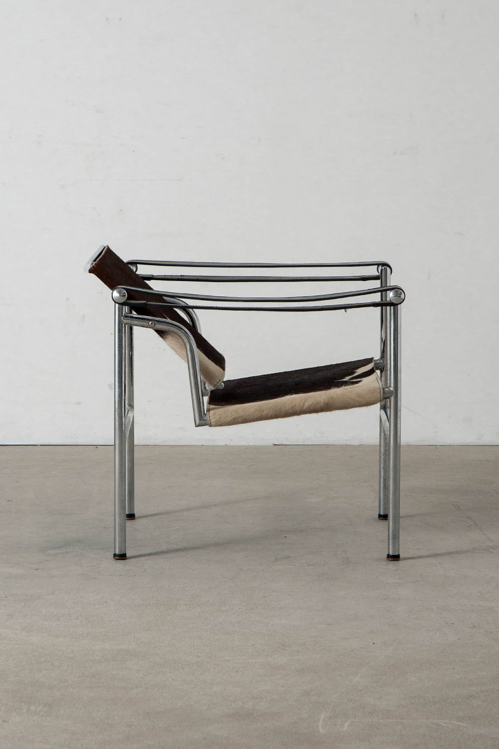 LC1 Chair by Le Corbusier , Charlotte Perriand , Pierre Jeanneret for Cassina in Calf Hair Leather and Chrome