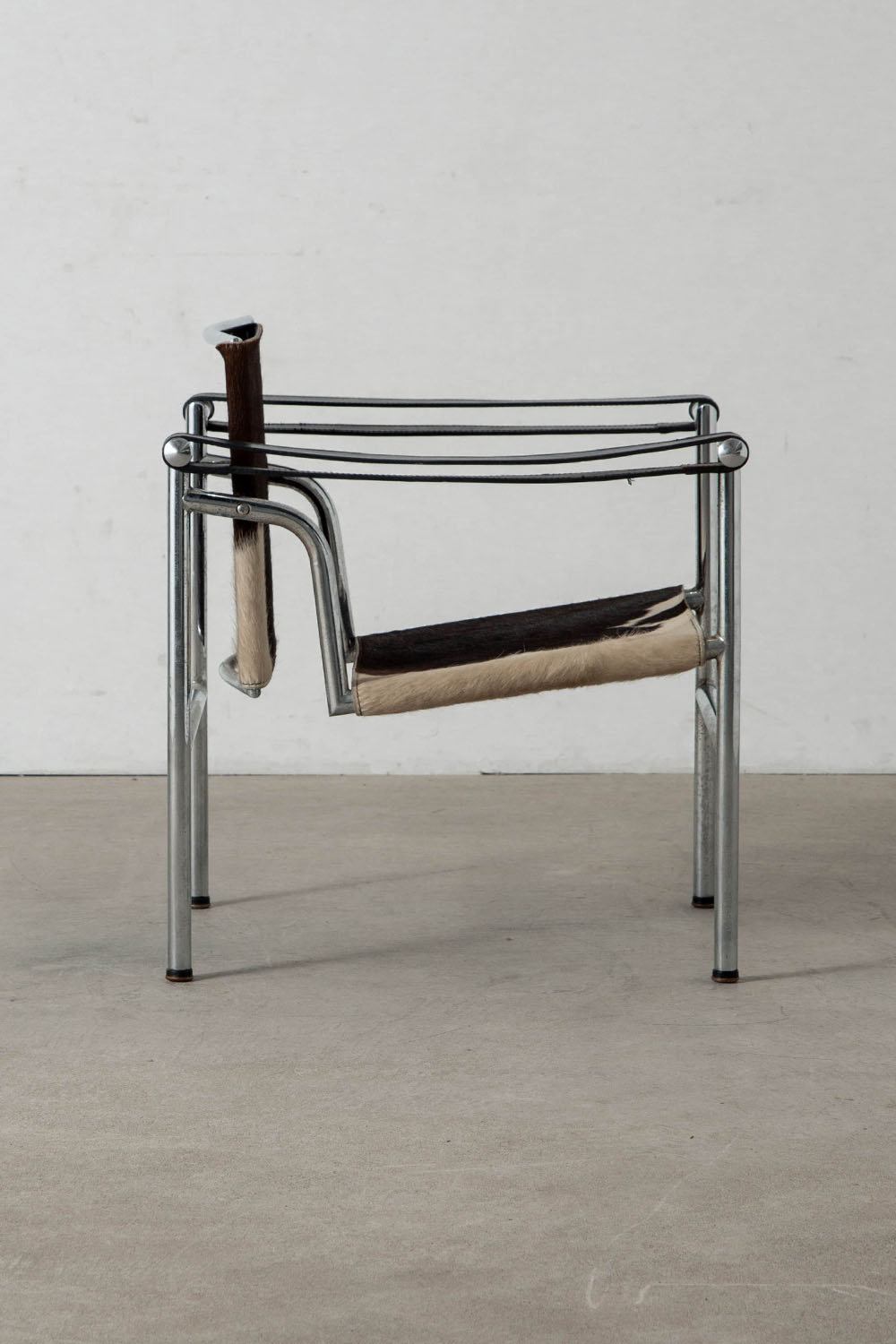 LC1 Chair by Le Corbusier , Charlotte Perriand , Pierre Jeanneret for Cassina in Calf Hair Leather and Chrome