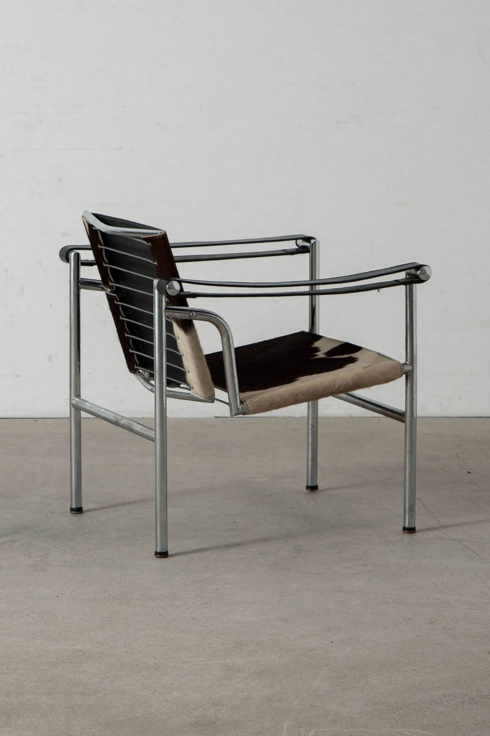 LC1 Chair by Le Corbusier , Charlotte Perriand , Pierre Jeanneret for Cassina in Calf Hair Leather and Chrome