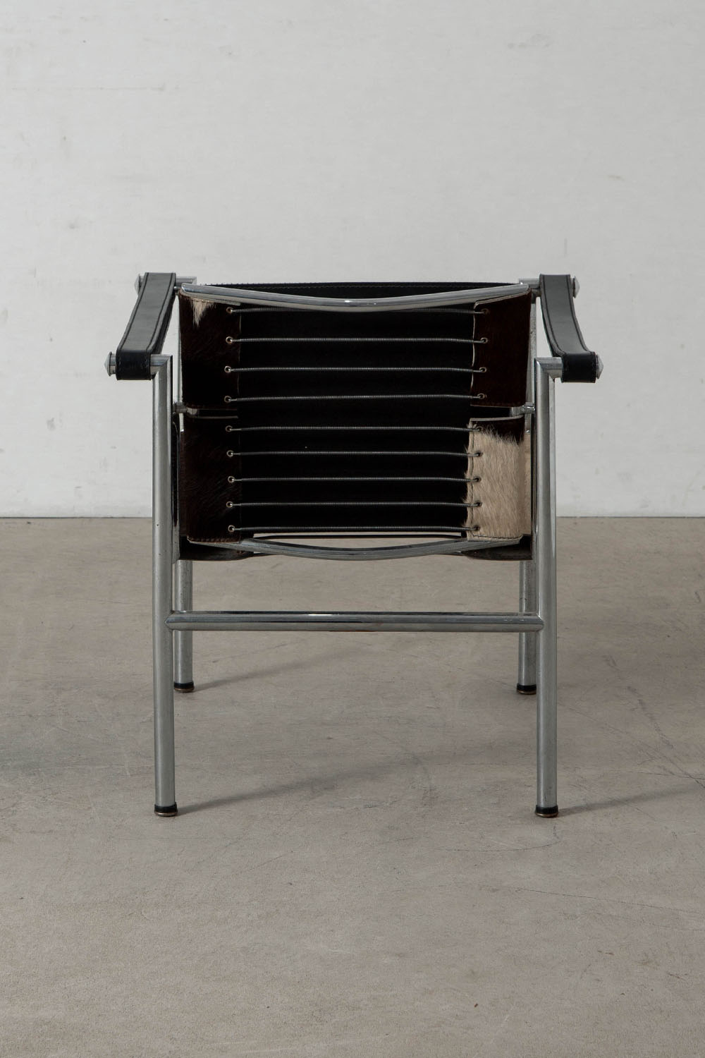 LC1 Chair by Le Corbusier , Charlotte Perriand , Pierre Jeanneret for Cassina in Calf Hair Leather and Chrome
