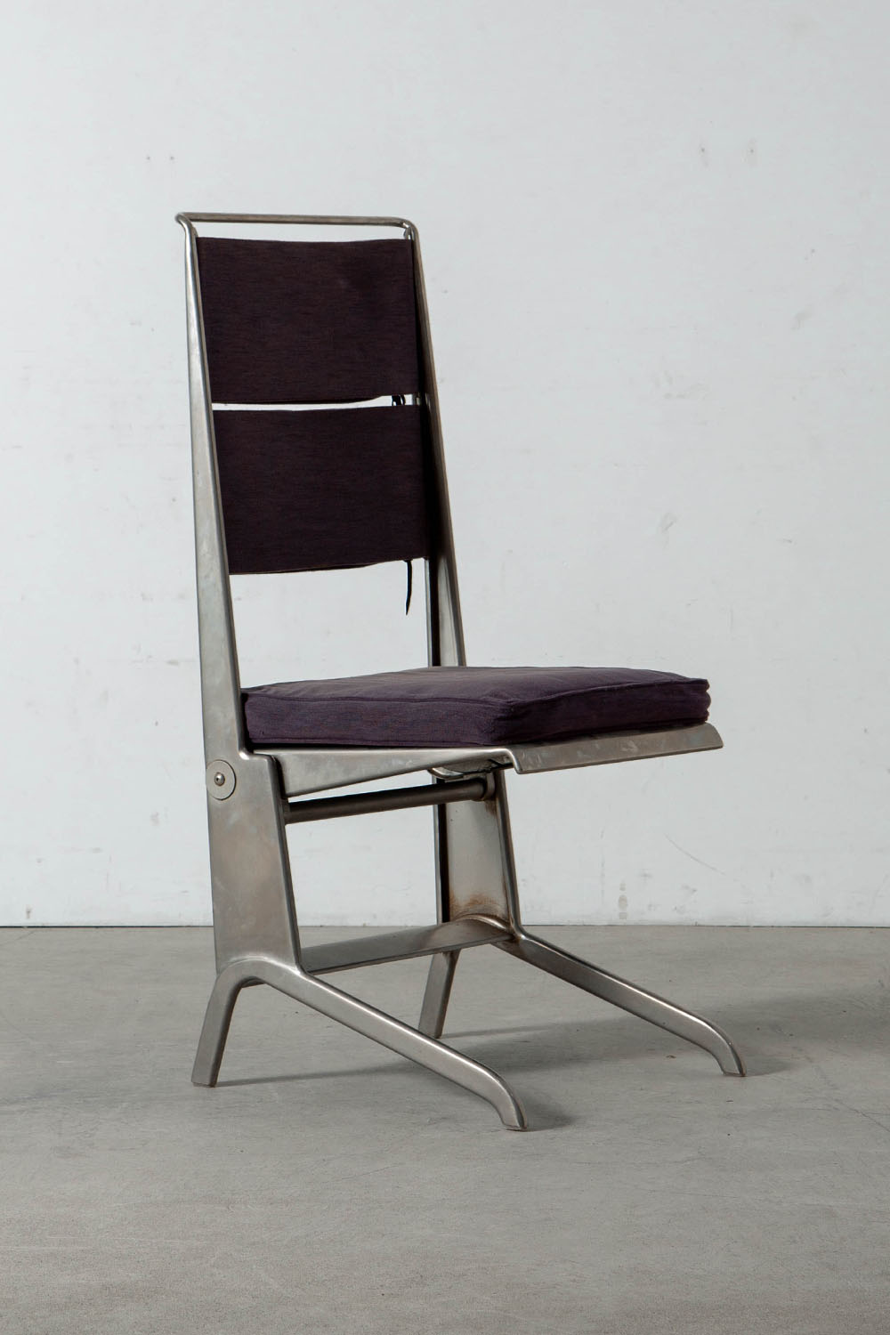 Folding Chair by Jean Prouvé for TECTA in Steel and Fabric