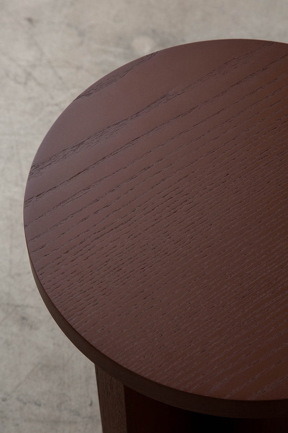 Rak Round Stool by Francesc Rifé for Kendo in Burgundy Ash